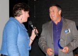 Northern Inland Innovation Awards MC, Jennifer Ingall from ABC Radio New England North West talking on stage to Graham Manvell (SSS BBQ Barns), a finalist in the Tourism / Leisure and Related Services Category.