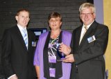 AusIndustry’s Regional Manager for Northern and Central NSW, Tim Cotter with Caroline and Robert Patterson, representing winners of the Professional and Retail Services Category, Computer Bank New England, Uralla, Armidale and Inverell