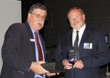 RDANI Deputy Chair, Herman Beyersdorf with Russell Stewart, representing the winner of the Research and Education Category, “The North West Advisory Group” and its Make it Work project.