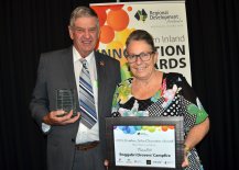 Boggabri Lions' Ron Boxsell, representing Retail, Tourism and Leisure finalist, Boggabri Drovers' Campfire, presented by Telstra Store Inverell's Wendy Wilks