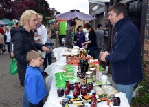 Kate Mather from Inverell kept son, Marcus in hand as she tasted some olives.