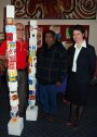 Fair Trading’s Brett Cunningham, the UNE’s Oorala Aboriginal Centre’s Colin Ahoy and RDANI Project Officer, Kim-Trieste Hastings with a sculpture entry.