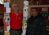 Fair Trading’s Brett Cunningham and the UNE’s Oorala Aboriginal Centre’s Colin Ahoy with a sculpture entry.