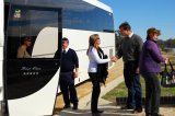 Merilba Estate’s Shaun Cassidy welcomes Armidale Visitor Information Centre Co-ordinator, Deborah Clark and other tour participants to his cellar door.
